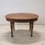 We present an elegant antique Italian oval table dating back to the mid-19th century. The table features typical features...