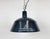 This industrial lamp was made by emax in hungary during the 1960s. It features a dark blue enamel shade with white enamel...
