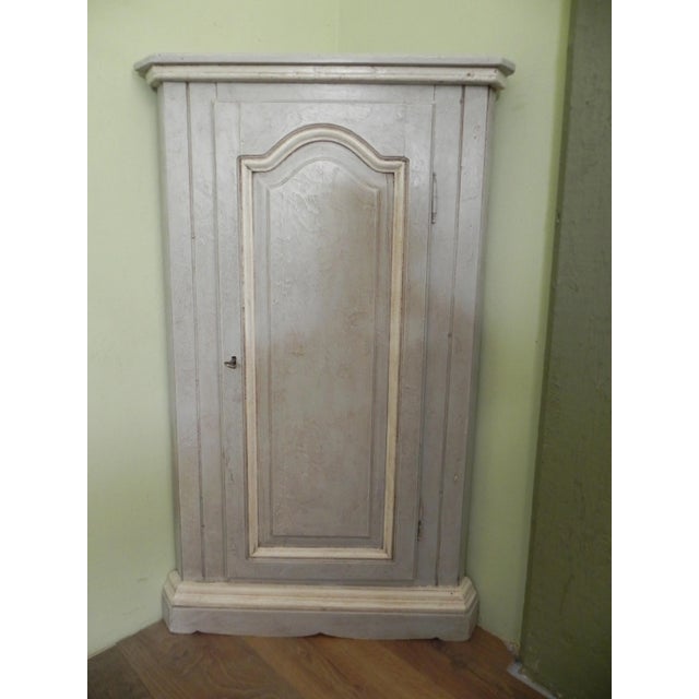 Corner Cupboard in Distressed Lacquer, in Restored conditions. Designed 1890 to 1919