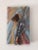 This artwork features a figure in motion, captured mid-dance with flowing hair and dynamic striped attire, set against a...