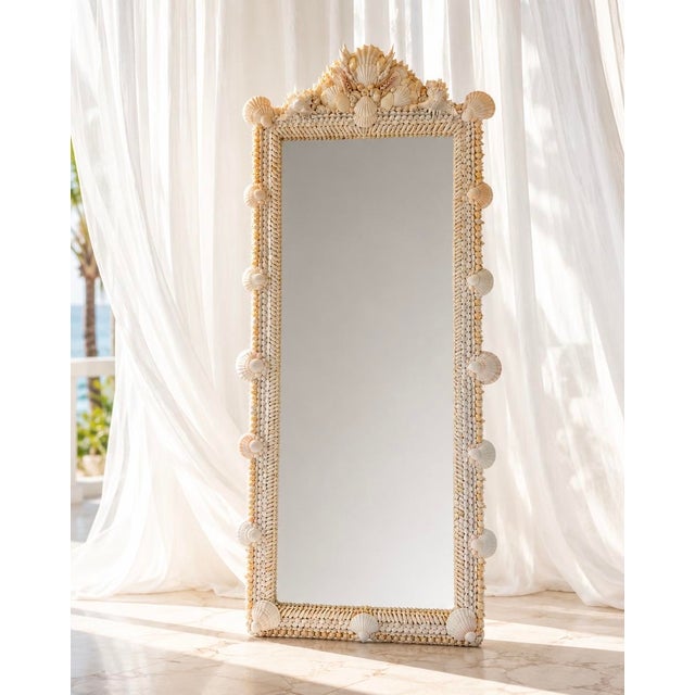 Grotto Style Shell Mirror composed off all natural shells set by hand. Tiered rows of scallops, murex, turbo shells, and...