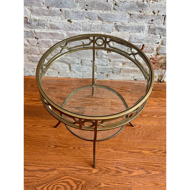 Elevate your space with our gorgeous Gold Metal and Glass Side Table! Made with stunning gold metal and featuring 2...
