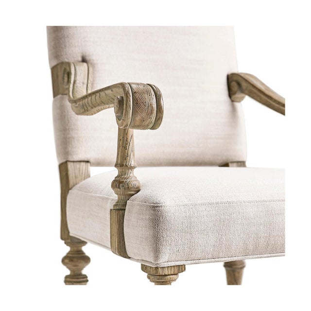 The armchair brings classic elegance to your space, updated with a relaxed, modern feel. Its tall, straight back gives it...