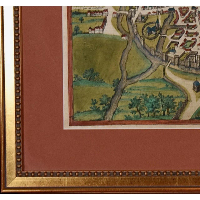 This is a framed 16th century map and city view of Canterbury, England entitled "Cantuarbury" by Braun & Hogenburg, from...