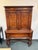 Design Plus Gallery presents an Antique Marquetry Hutch from Orinoco Furniture Company. This is a collectible early 20th-...