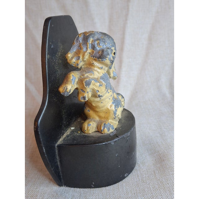 Up for sale is an antique 1920s cast iron doorstop manufactured by the renowned H.L. Judd Company of Connecticut (Pattern...