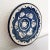 Lovely vintage, hand painted bowl featuring a fish and wave pattern in classic blue and white hues on terracotta body....