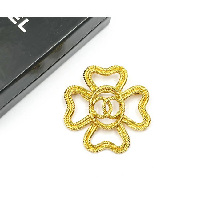 Chanel Vintage Gold Plated Rope Cross CC Brooch *Marked 28 *Made in France *Comes with the original box – It is...