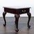 Chippendale style end table made of mahogany wood with flame top. It features a single dovetailed joined drawer adorned...