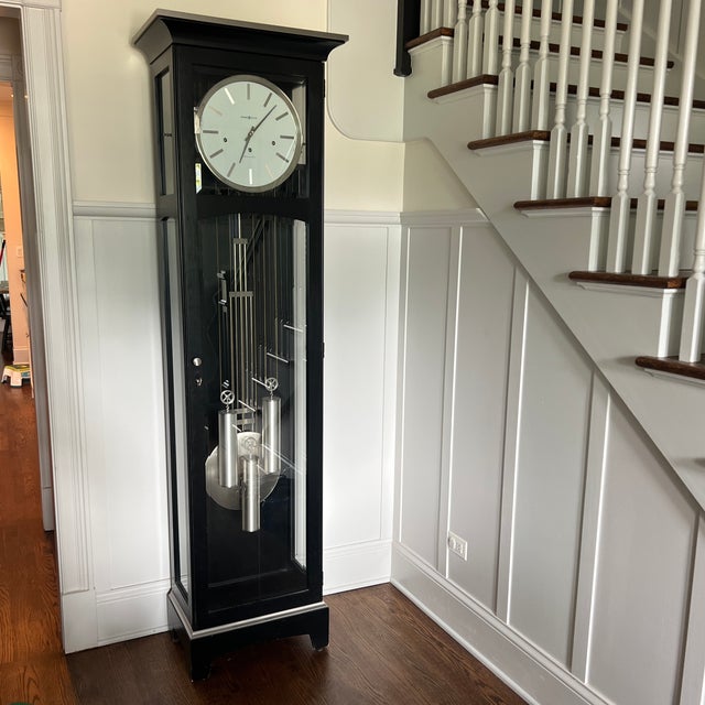 Elevate your entryway or living area with this striking, ultra-modern interpretation of the classic grandfather clock from...