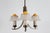 Art Deco 3-armed chandelier manufactured by Fog & Mørup in Copenhagen in the 1930s and 1940s The frame is made of brown...