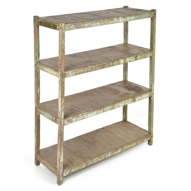 This shelf on patinated wooden legs seduces with its authentic look and its practical side. Its simple design, combined...