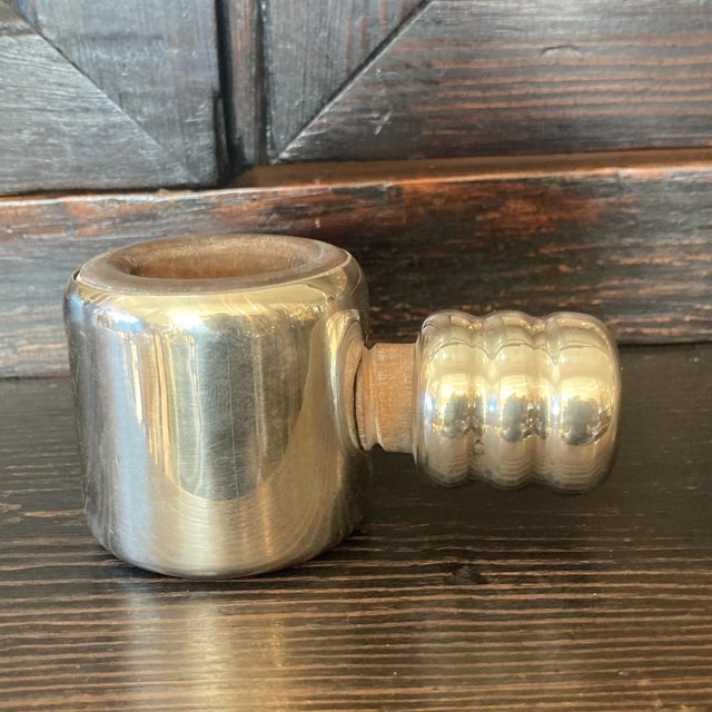 Cartier sterling and wood screw nut cracker.