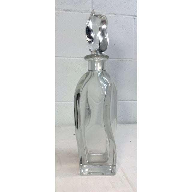 Up for sale is a nice quality large vintage hand blown clear crystal decanter by Daum. It has an exquisite a-symmetrical...