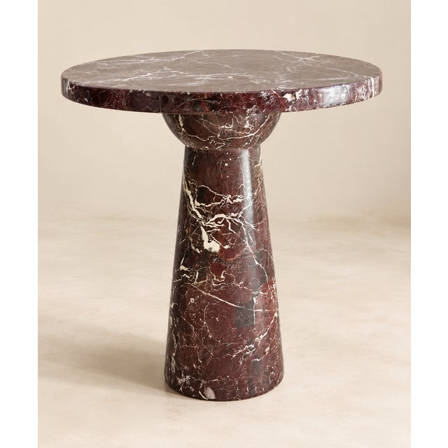 Bring timeless elegance to your space with this Rosso Levanto marble pedestal table, featuring a rich burgundy-red marble...