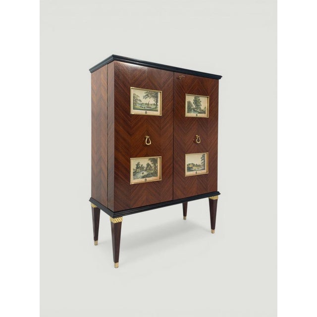 This elegant cabinet bar, designed in the 1950s, fully represents the elegant and refined language of classical origin...