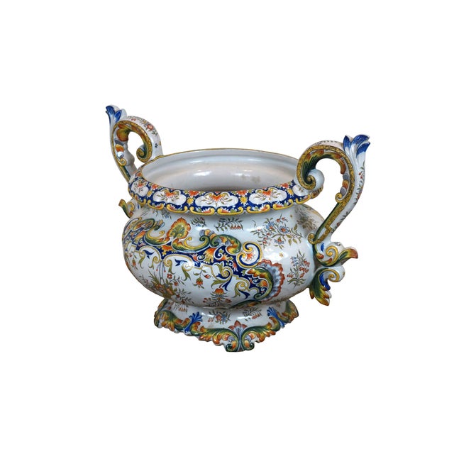 Antique French faience enameled porcelain urn / jardiniere / planter / cachepot featuring an ornate swirling foliate and...
