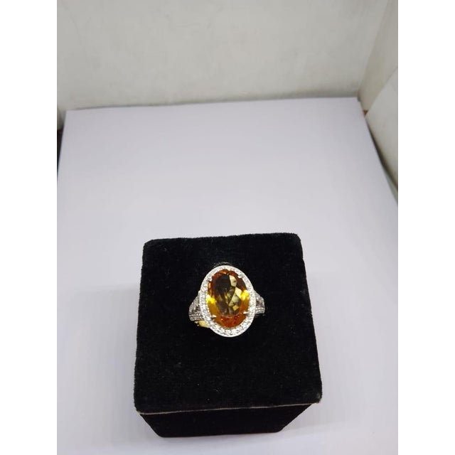 Gemstone details Gold Purity: 18K Solid Gold Yellow tourmaline: 4.50 cts Diamond: 0.55 cts 18K gold Gross weight: 4.89...
