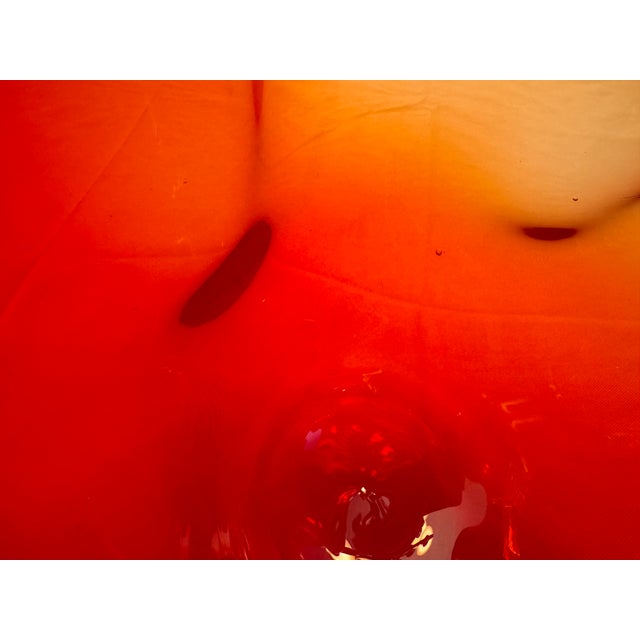 A striking and substantial work of contemporary American studio glass by renowned artisan Rollin Karg (American, b. 1944)....