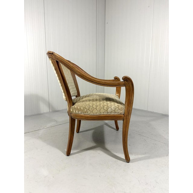 Elegant arm chair. Beautiful shaped wooden frame with nice patina, spring coiled seat, original velour fabric. 1900’s. In...