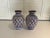 Handcrafted and glazed Moroccan ceramic set of two vases. Featuring an elaborate hand-painted Moorish pattern in a...
