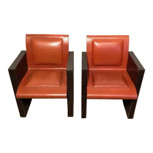 1970s French Orangeish and Brown Leather Armchairs - a Pair