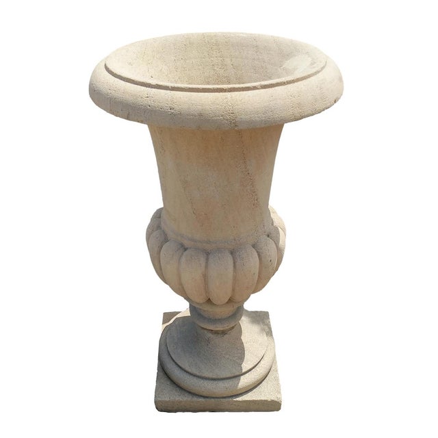 Sandstone urn planter originates from 1920s colonial India, where classical European forms were reinterpreted through...