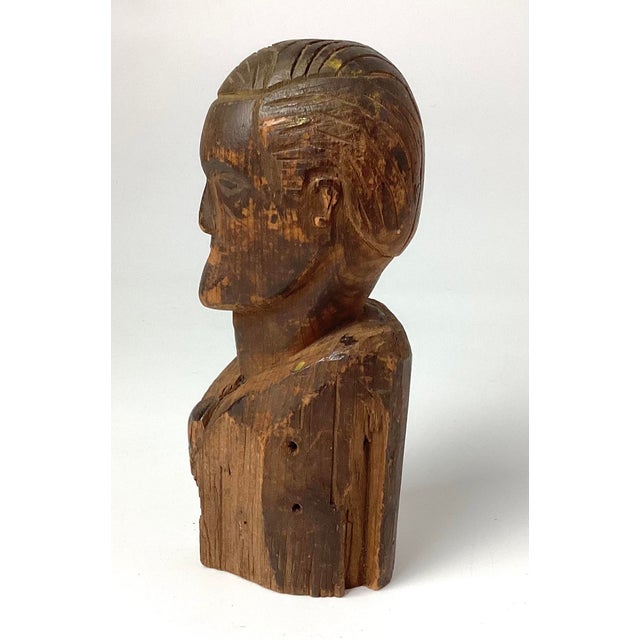 Antique Folk Art Hand Carved Wood Bust. 7 inches tall by 3 inches deep by 2 1/2 inches wide. Nice age appropriate...