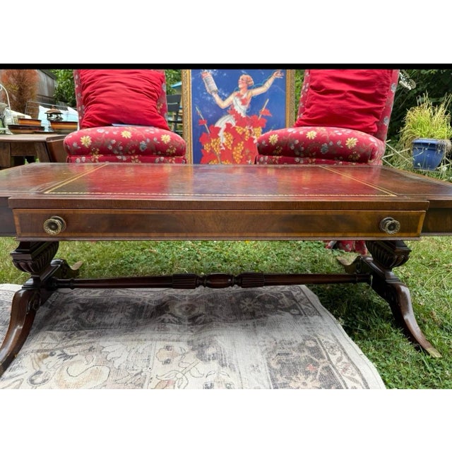 An authentic beautiful 1930s Weiman Furniture Company English Regency Coffee Table, commonly designated as part of their...
