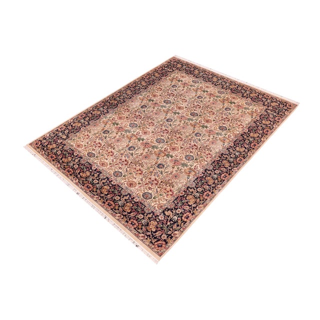 Designed with mesmerizing intricacy and gorgeous color palette, this hand-knotted masterpiece demonstrates the beauty and...