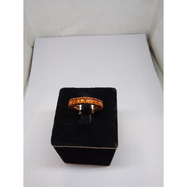 Gemstone details Gold Purity: 18K Solid Gold Orange sapphire: 5.92 cts 18K gold Net weight: 4.10 grams Gross weight: 5.28...