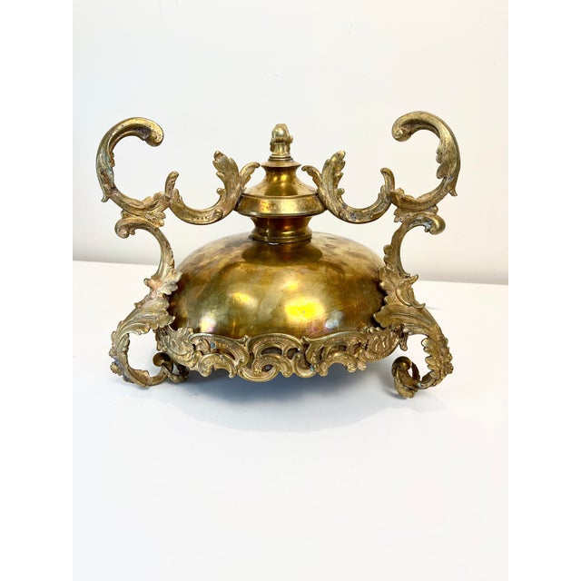Beautiful and ornate antique bronze centerpiece bowl with three Rococo-style scrolling handles. This is a heavy and...