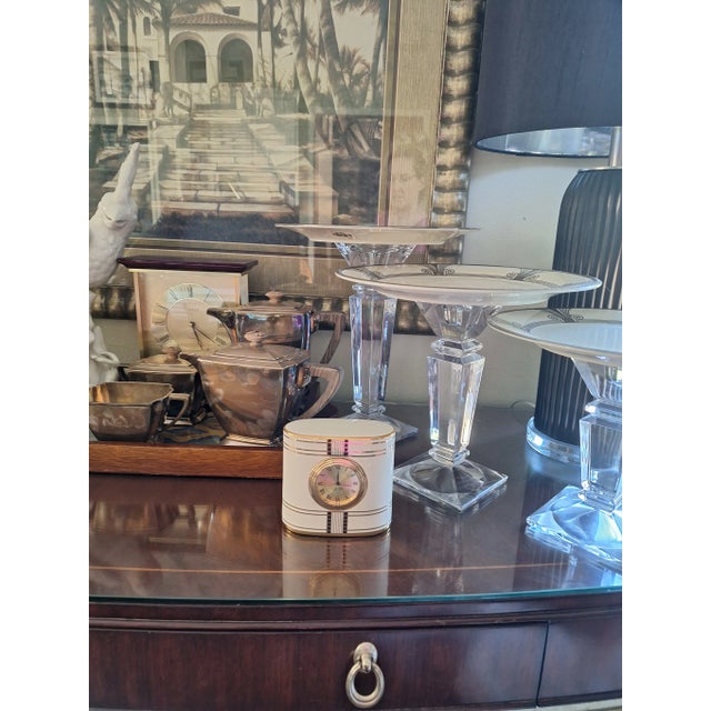 Here is a vintage classic design desk clock in Art Deco style by Lenox. In signature creamy white porcelain with gold and...