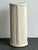 This vintage painted rattan pedestal is a refined example of mid-century design, blending organic materials with a clean,...