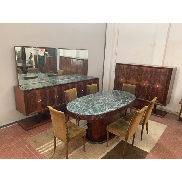 Art deco room with excellent carpentry and made with quality materials. on the bases of the furniture rests the central...