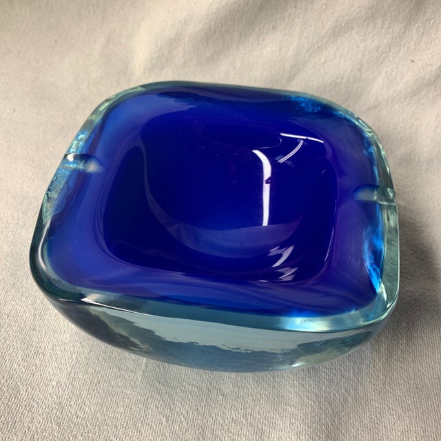 This item appears to be a Mid-Century Modern Murano Sommerso glass bowl, a vintage decorative piece often attributed to...