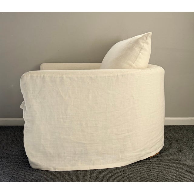 Wren Slipcovered Chair purchased directly from Community Mfg. Ivory linen slipcover, Trillium fill and Natural oak feet....