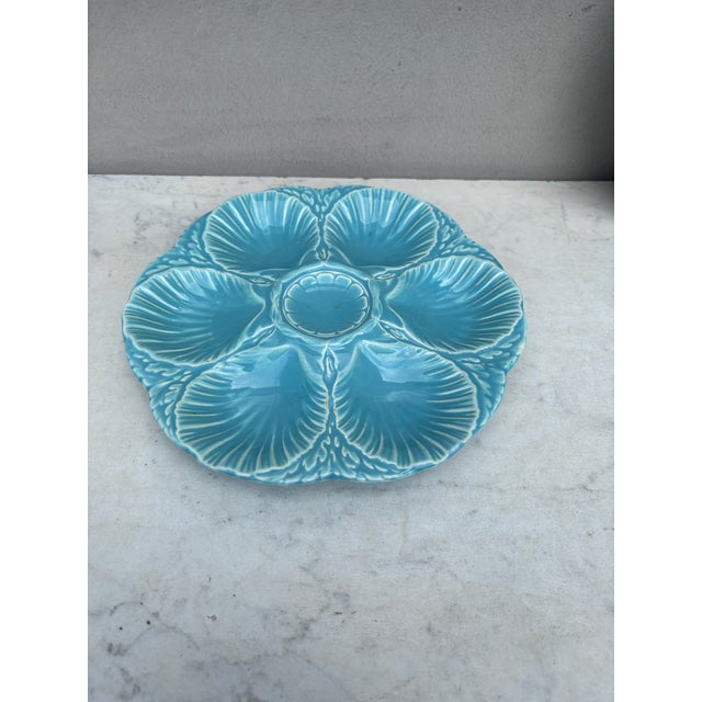 French aqua turquoise Majolica oyster plate signed Sarreguemines Majolica, circa 1900. 6 shells and space for the lemon on...