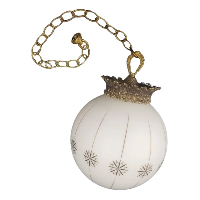 A Halcolite round globe ceiling light fixture shade. It doesn't have any wiring and will need to be rewired. There's a...