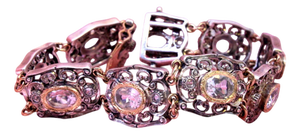 Gold and Silver Bracelet with Oval-Shaped Calibrated Tanzanites