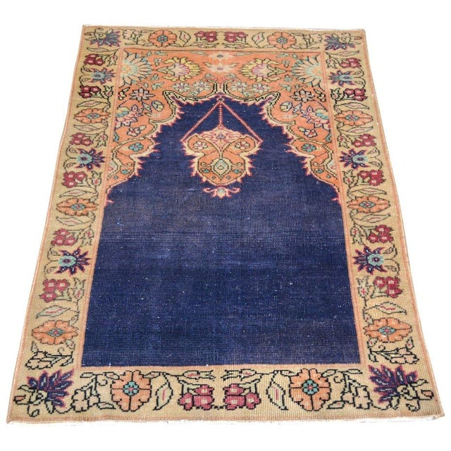 Hand-knotted with care using traditional rug-making techniques, this wool rug blends timeless craftsmanship with a modern...