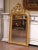 This elegant antique wall mirror was crafted in France circa 1870 and displays the graceful curves and exuberant ornament...