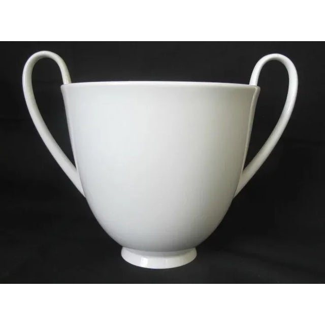 Art Deco German KPM Berlin porcelain urn shape vase with loop handles in blanc de chine. Measures 5 3/4" tall x 7 1/4"...