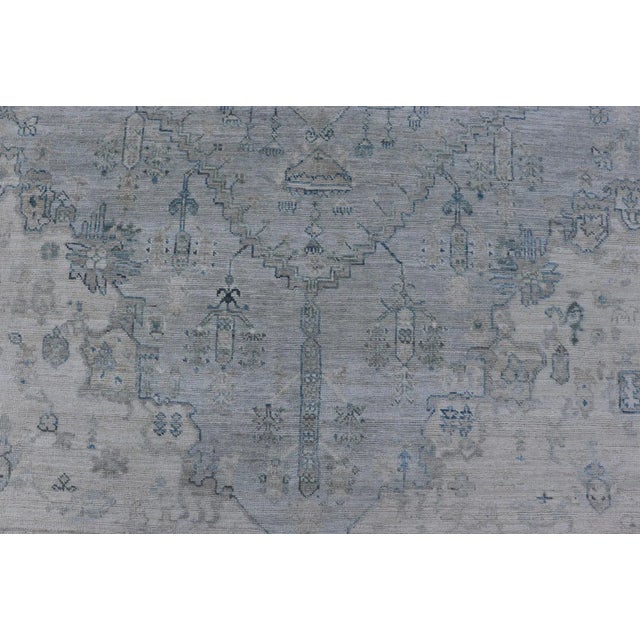 Textile Modern Designed Rug With a Light Blue Background and Tribal Medallion Motifs For Sale - Image 7 of 12