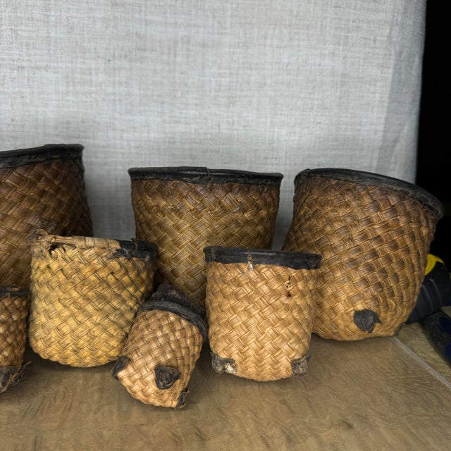 Tribal Early 20th Century Central African Graduated Nesting Basket Set, 12 Pieces With Original Stopper For Sale - Image 3 of 12