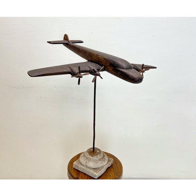 Beautiful Handmade Airplane Hercules C130 made of oak wood. Very decorative old object with a great and sober lived in...