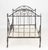 French Wrought Iron Daybed, 19th century, atop casters. 46.5" H x 74.5" W x 40.25" D. Provenance: From the Collection of...