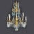 A Genoese twelve-light gilded Empire chandelier, composed of a turned, carved, and gilded wooden shaft and twelve gilded...