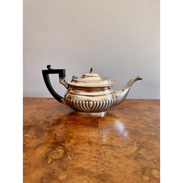 Antique Edwardian silver plate three piece tea set, having a quality antique Edwardian three piece tea set comprising of a...