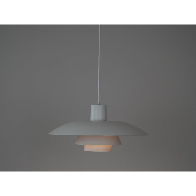 The ph 4/3 lamp is an absolute classic, designed by the renowned danish designer and architect poul henningsen. It has...
